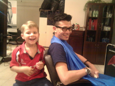 Conrad cutting Raymond's hair!
